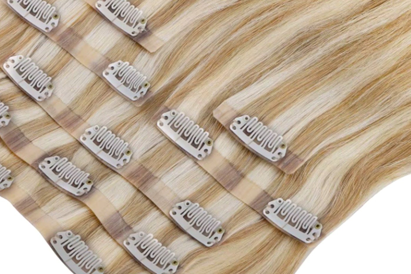 Seamless silicone weft clip-in human hair extensions showing flat band and anti-slip metal clips